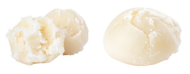 Shea Butter Balls Isolated on White Background Depicting a Close Up View of Creamy Yellow Spheres in a Studio Setting Emphasizing Texture and Organic Forms