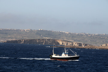 Fishing boat off the coast of Gozo, Malta