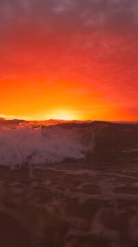 Slow-motion video of a wave splashing into the camera at sunrise, captured at Bronte Beach, Sydney, Australia.