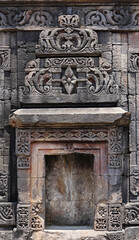Majestic ancient relief on the wall of Baijnath Temple, part of Baijnath Group of Temples, in Bagheshwar, Uttarakhand, India.