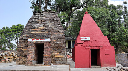 Perspective of Kuber Temple and Batuk Temple within the grounds of Vridh Jageshwar Temple, located...
