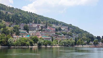 Fototapeta premium Captivating cityscape encircling the Naini Lake in Nainital, Uttarakhand, India.