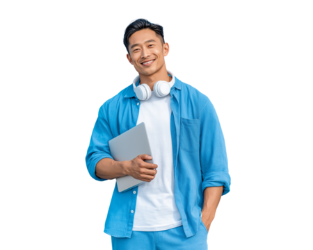  a handsome young asian man smiling, holding a laptop and wearing headphones