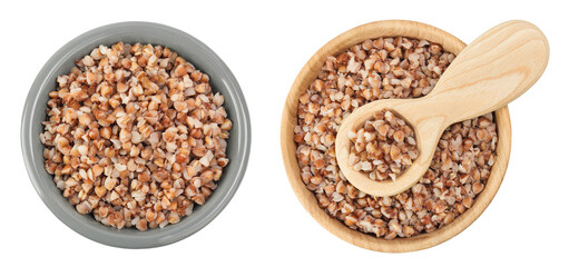 Boiled buckwheat in a ceramic and wooden bowl isolated on white background. Top view. Flat lay