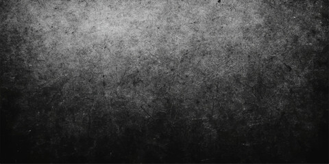 Grungy, textured gray concrete wall with a vintage, aged, and dirty black surface pattern for a dark backdrop