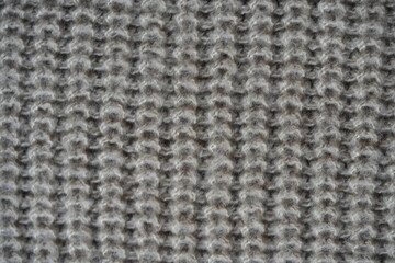 texture of knitted light brown sweater, close-up texture of beige knitted fabric, macro texture of tan knitted woolen clothes	

