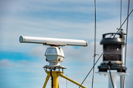 Surveillance camera on the roof of a cruise ship with blue sky