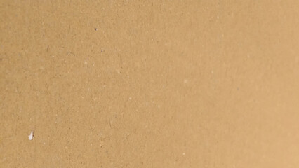 Background of brown kraft paper or cardboard texture. close up of cardboard texture background.