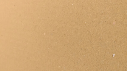 Background of brown kraft paper or cardboard texture. Brown recycled paper texture background.