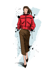 Set of young beautiful women in stylish clothes. Fashion sketch