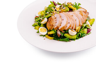 Grilled chicken salad with fresh vegetables and hard-boiled eggs on plate