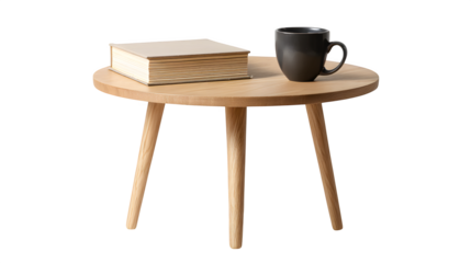Still life of a book and a dark mug on a small round wooden table against a stark scene