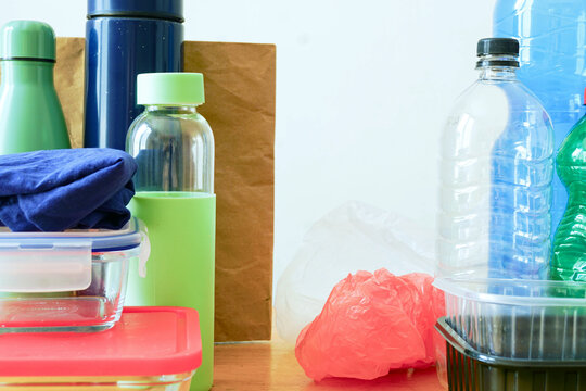 Everyday objects divided into disposable plastics and durable eco packaging. Presentation underlines choosing sustainability. Concept of mindful consumption, healthy habits and conscious living