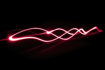 Abstract crimson light trails on black backdrop, wavy, dynamic