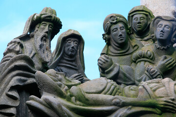 Fototapeta premium Guimiliau calvary. Life of Jesus. Entombment . Brittany. France.