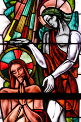 Poissy collegiate church. Stained glass window. Baptism of Jesus Christ by Saint John the Baptist. ...