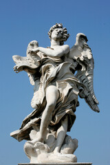Saint Angelo bridge statue : Angel .  Rome. Italy.
