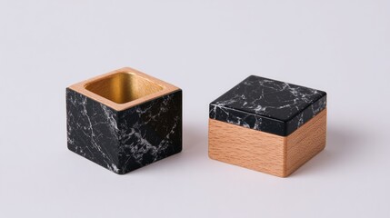 Two decorative containers with marble tops and wooden bases