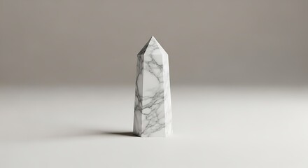 Fototapeta premium Elegant Marble Obelisk Sculpture on a Neutral Background Displayed with Style