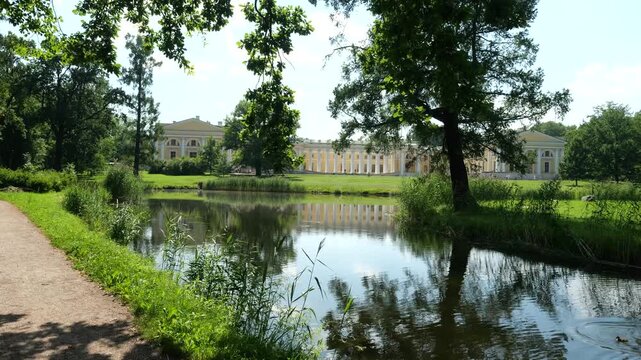POV walking along Fasade pond to the Alexander Palace of Tsarskoye Selo, Pushkin, Russia