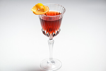 Cosmopolitan cocktail in a glass on the background