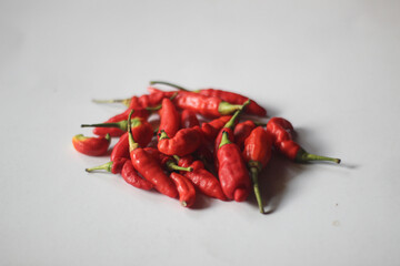 red chilies on a plain white background