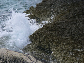 waves crashing on rocks