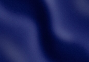 Blue abstract background with glowing light and smooth flowing texture