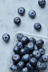 Blueberries pack on light background