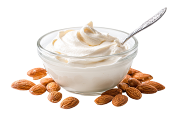 Creamy almond-based spread in a glass bowl, surrounded by almonds