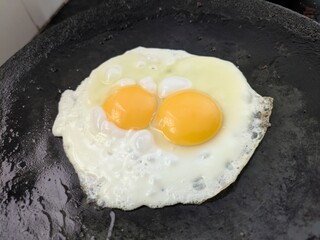 fried egg in a frying pan
