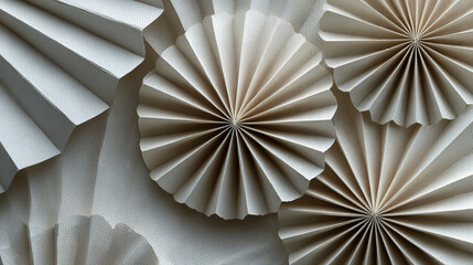 White Paper Fan Decorations with Geometric Folds, Minimalist Abstract Patterns, Radial Symmetry, and Elegant Origami Inspired Design for Modern Backgrounds and Creative Projects