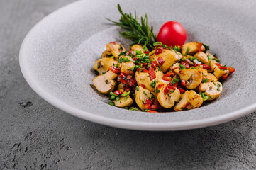 Sauteed mushrooms with herbs in a plate
