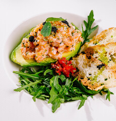 Gourmet avocado and salmon tartare on plate