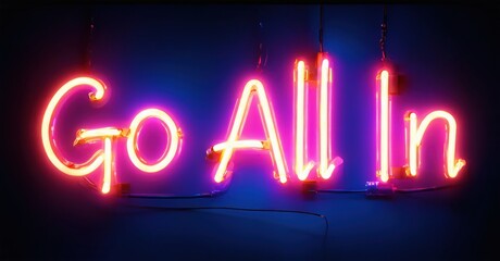 Bright neon sign displays text Go All In. Vivid pink glows against dark blue background. Simple, bold message.