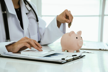 Fototapeta premium A piggy bank with a stethoscope symbolizes health insurance, medical savings, financial planning, protection, and investment for future security.