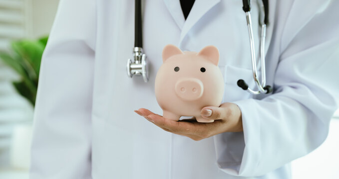 A doctor inspects finances with health concepts, linking insurance, savings, investment, and medical care for future security, prosperity, and wellness. - Powered by Adobe