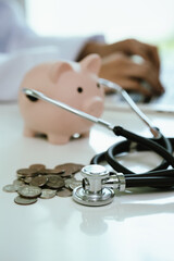 A doctor inspects finances with health concepts, linking insurance, savings, investment, and medical care for future security, prosperity, and wellness.