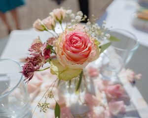 Elegant Floral Arrangement with Pink Rose at Event