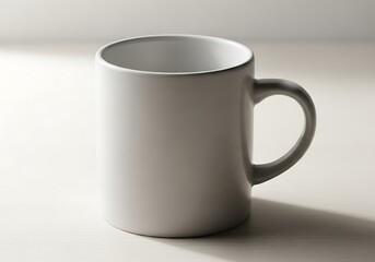 Obraz premium Minimalist serene stoneware cup on light table surface casting soft shadow, perfect for presenting beverages
