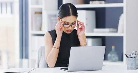 Glasses, laptop and stress with business woman at desk in office for burnout, debt or tax review. Computer, eye strain and finance with corporate employee in workplace for investment fail or mistake