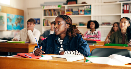 Lesson, girl student and attention in classroom for learning, academic information and education. Teenager, people and listening with books at high school for development, writing notes and knowledge