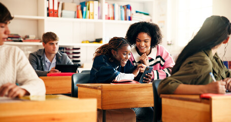 High school, students and happy friends with mobile in classroom for exam results or online report. Teenager, phone and girls together for education, success and good news for scholarship application