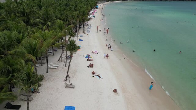 Tourists Swimming in Crystal Waters at Bai Sao Beach Phu Quoc