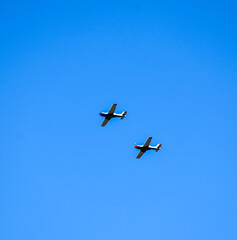 Combat aircraft flying in formation during aerial display above Belgrade. Captured on August 2, 2025, during military aviation display event.