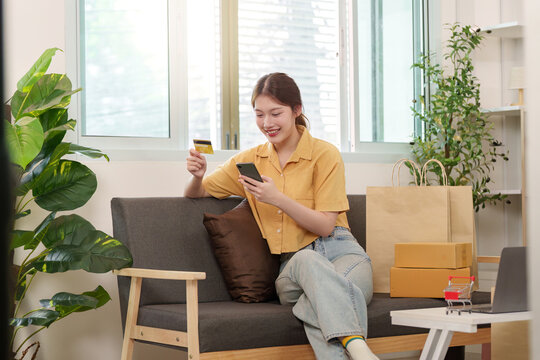 Cyber Monday joy with online shopping and credit card in hand