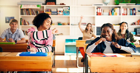 Girl, teenager and celebration in classroom for education, development or answer for quiz at high school. Pupil, group and happy with fist pump, scholarship and excited for learning goals at academy