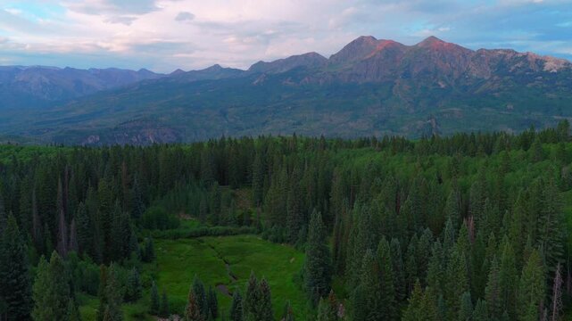 Kebler Pass Lost Lake campground summer sunset Crested Butte Paonia aerial drone Colorado Ruby Peak Sawatch Range Rocky Mountains Irwin Lake Ohio Pass Aspen Trees Forest blue sky forward pan up