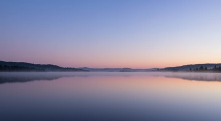 Fototapeta premium Serene Dawn Over Calm Lake with Mist and Soft Pastel Sky Colors