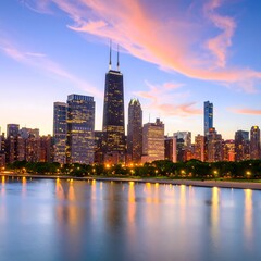 Fototapeta premium City skyline at sunset over water (1)